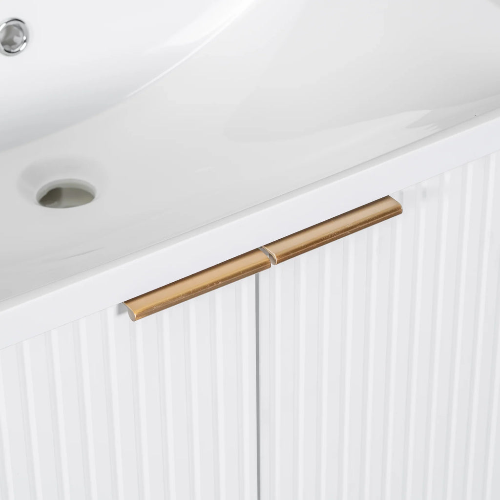 Close-up of gold metal handles on white eprolo bathroom vanity cabinet doors.