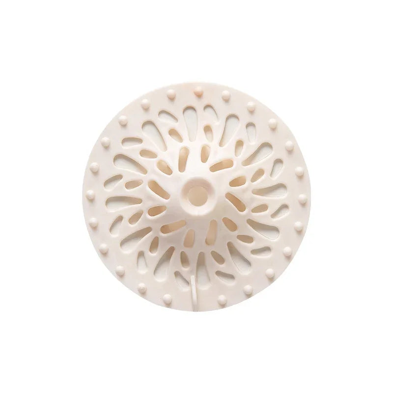 White volcano-shaped anti-clogging floor drain cover and hair filter by eprolo