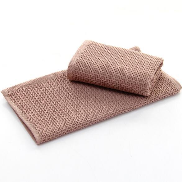 Dusty rose waffle weave cotton hand towel by eprolo for bathroom or face care.