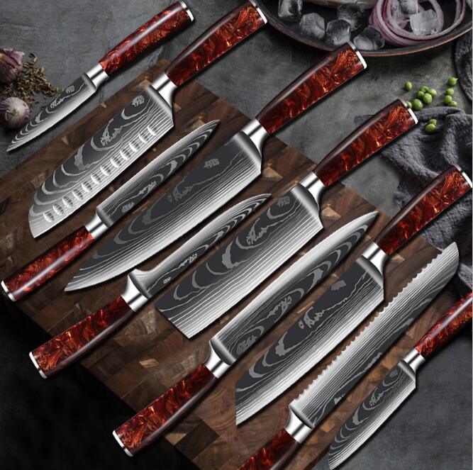 Set of eprolo high carbon stainless steel professional chef knives with patterned blades.