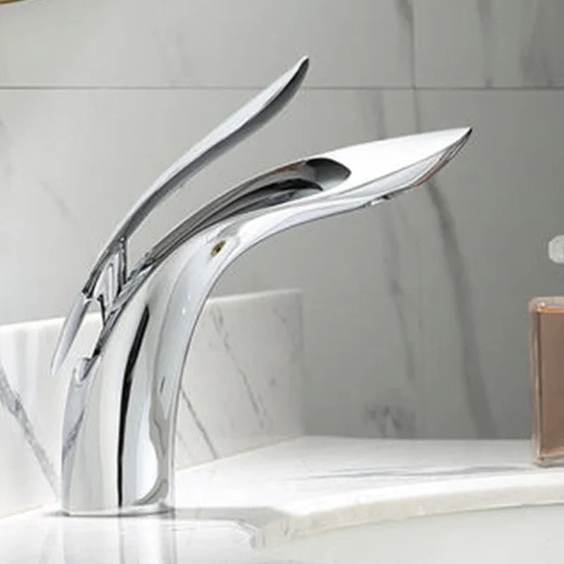 Modern chrome creative personalized bathroom washbasin faucet by eprolo on a marble counter