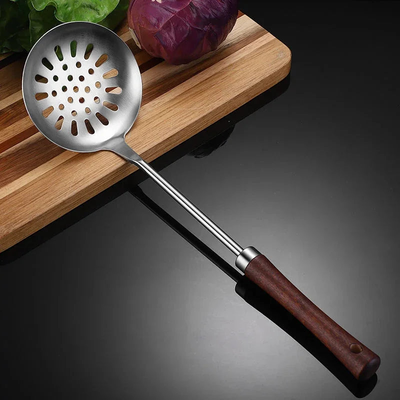 eprolo 304 stainless steel slotted spoon with a wooden handle on a cutting board