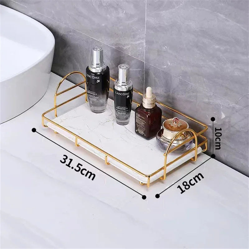 ePROLO gold metal and marble cosmetic storage rack with skincare bottles on a bathroom counter