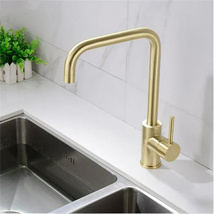 eprolo brushed gold stainless steel kitchen faucet installed on a white countertop next to a sink