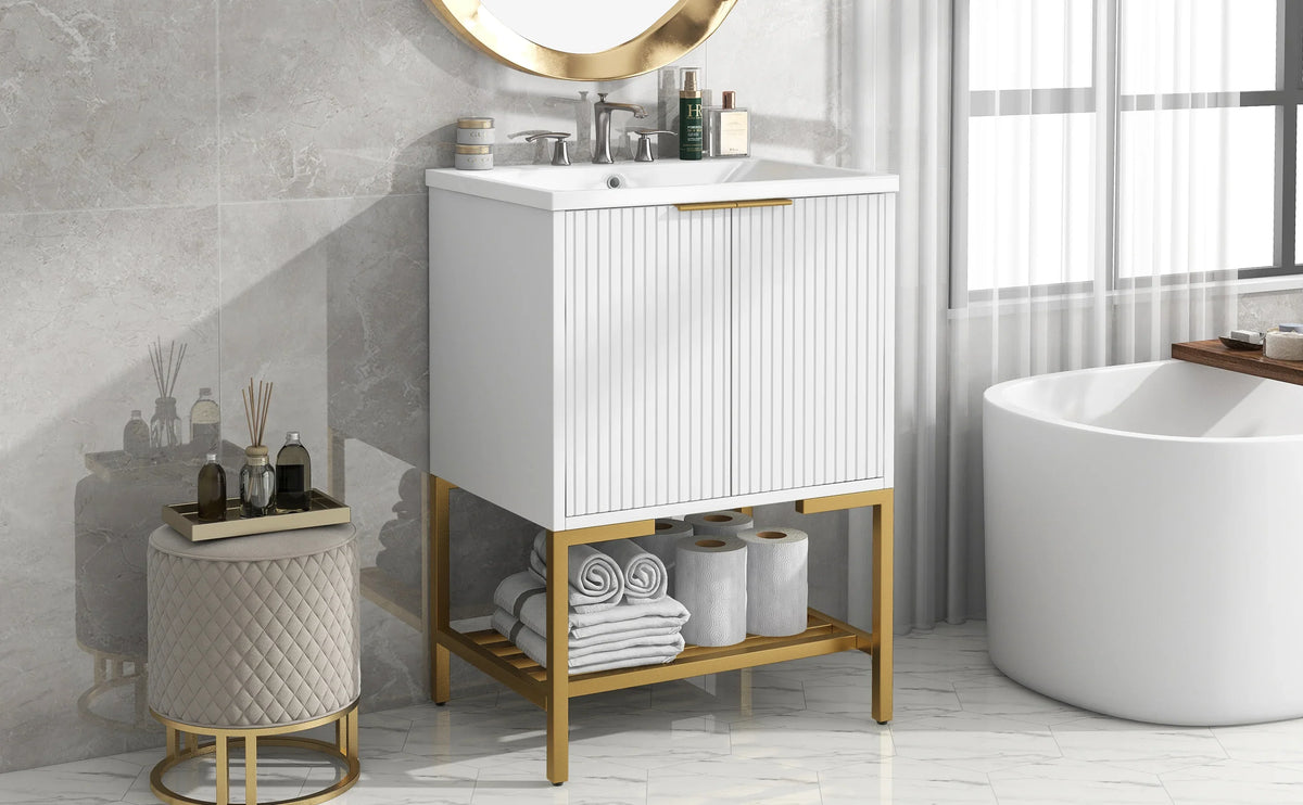 White 24 inch eprolo bathroom vanity with gold metal frame and open storage shelf.