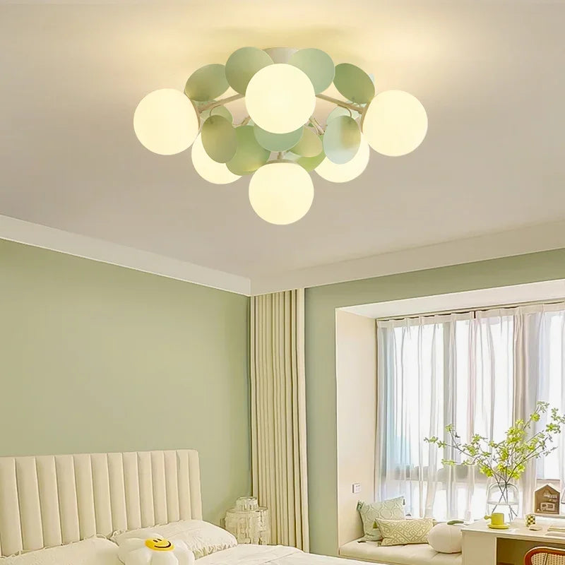 eprolo Creative Magic Bean ceiling light with globe lamps and leaf accents in a bedroom