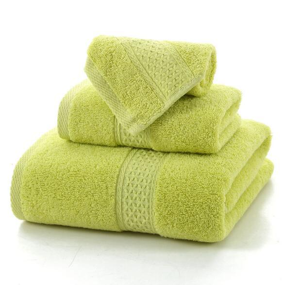 Set of three lime green eprolo 100% cotton terry bath towels.