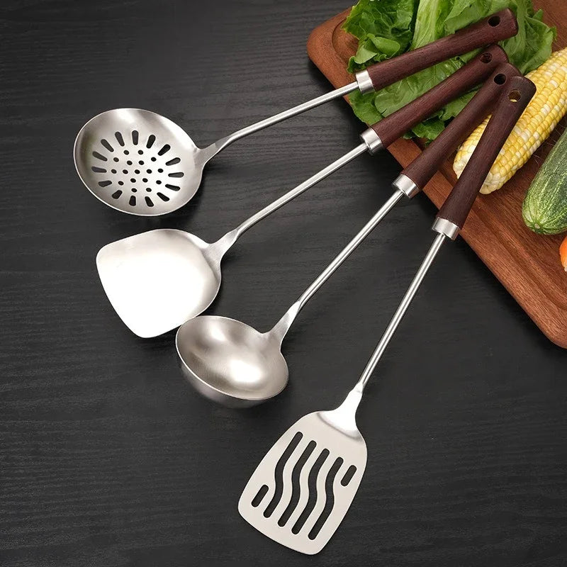 eprolo 304 stainless steel kitchen utensil set with dark wooden handles on a dark surface