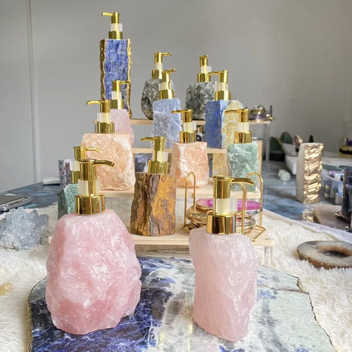 Collection of eprolo natural crystal stone liquid soap dispensers in various colors.