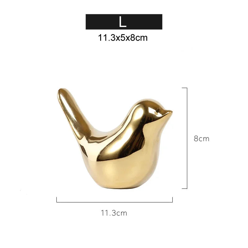 Golden ceramic bird ornament by eprolo with dimensions 11.3x5x8cm.