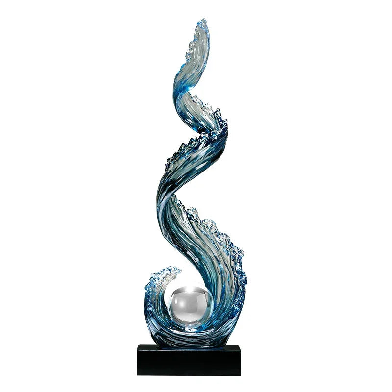 Eprolo blue glass wave sculpture with a crystal sphere on a black base