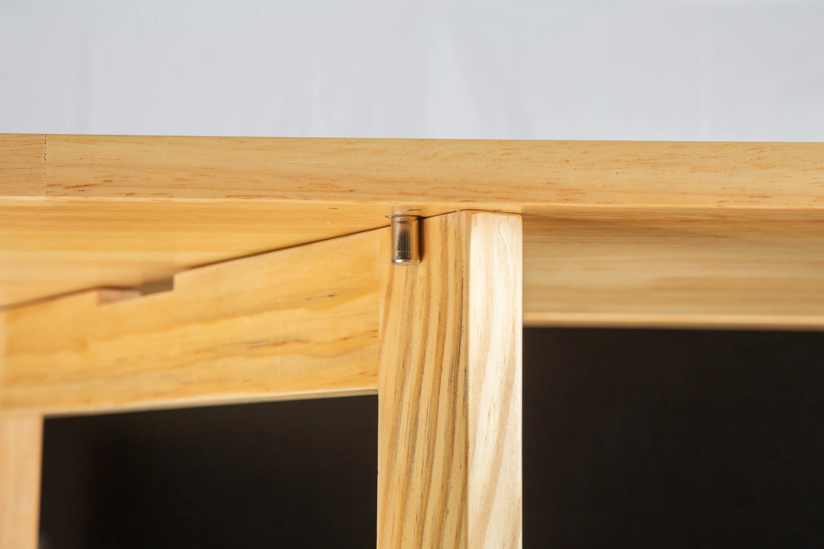 Close-up of the wooden joint and hardware of an eprolo rubber wood kitchen island countertop.
