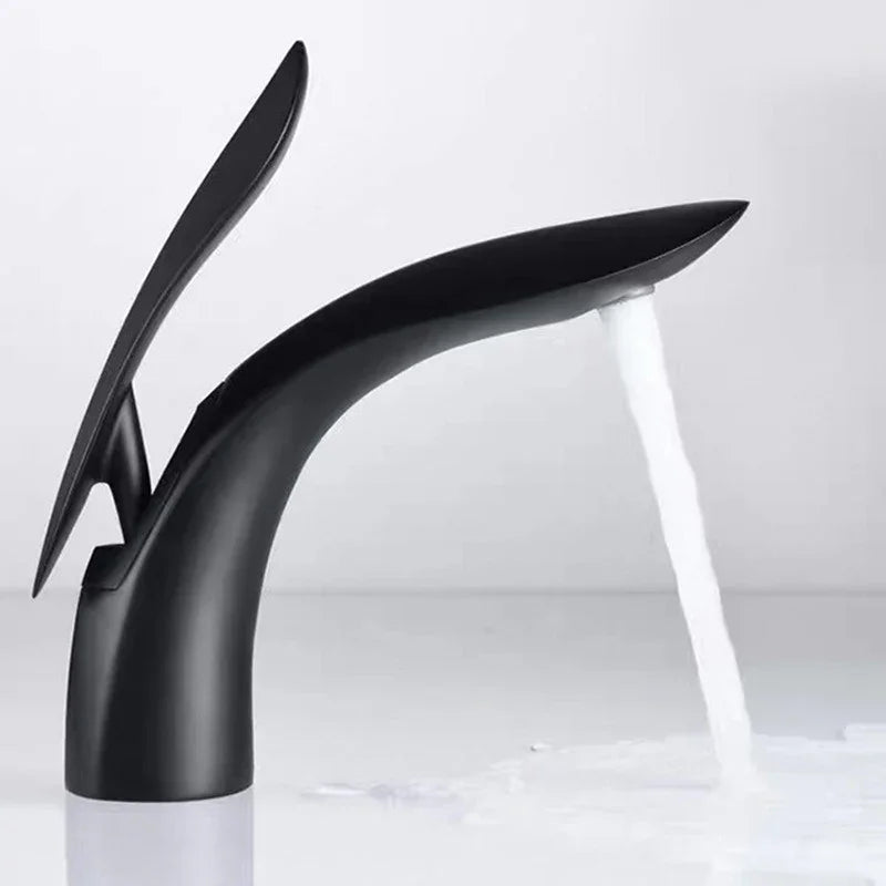 Modern matte black creative washbasin faucet by eprolo with water flowing