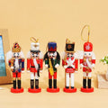 Set of five 12cm wooden nutcracker Christmas ornaments by eprolo in festive colors.