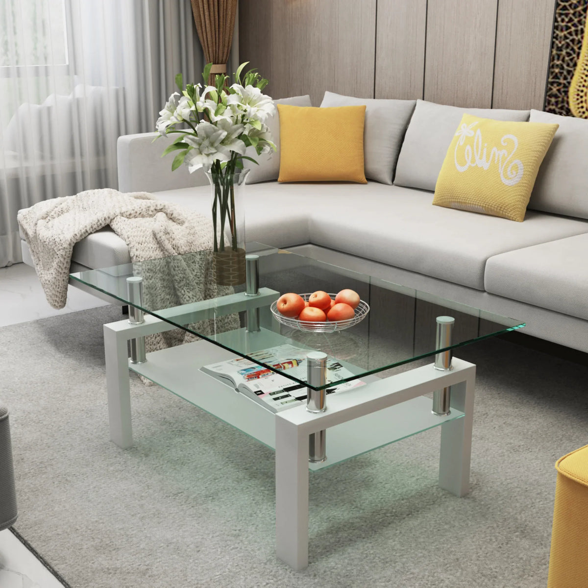 Modern eprolo white and clear glass coffee table in a living room with a grey sectional sofa.