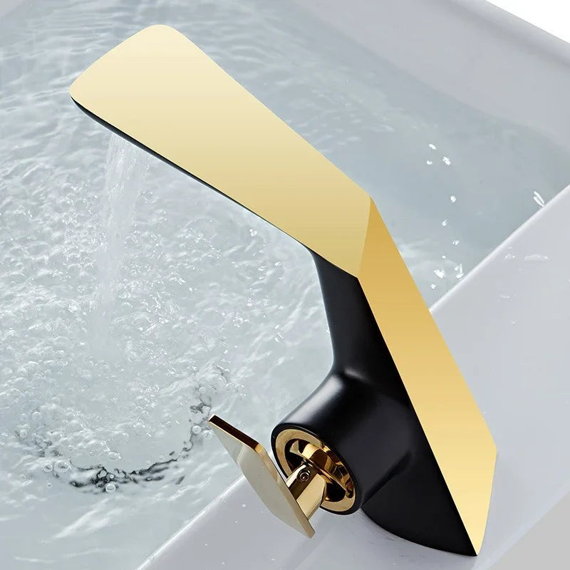 Modern eprolo gold and black bathroom faucet with water running into a white sink