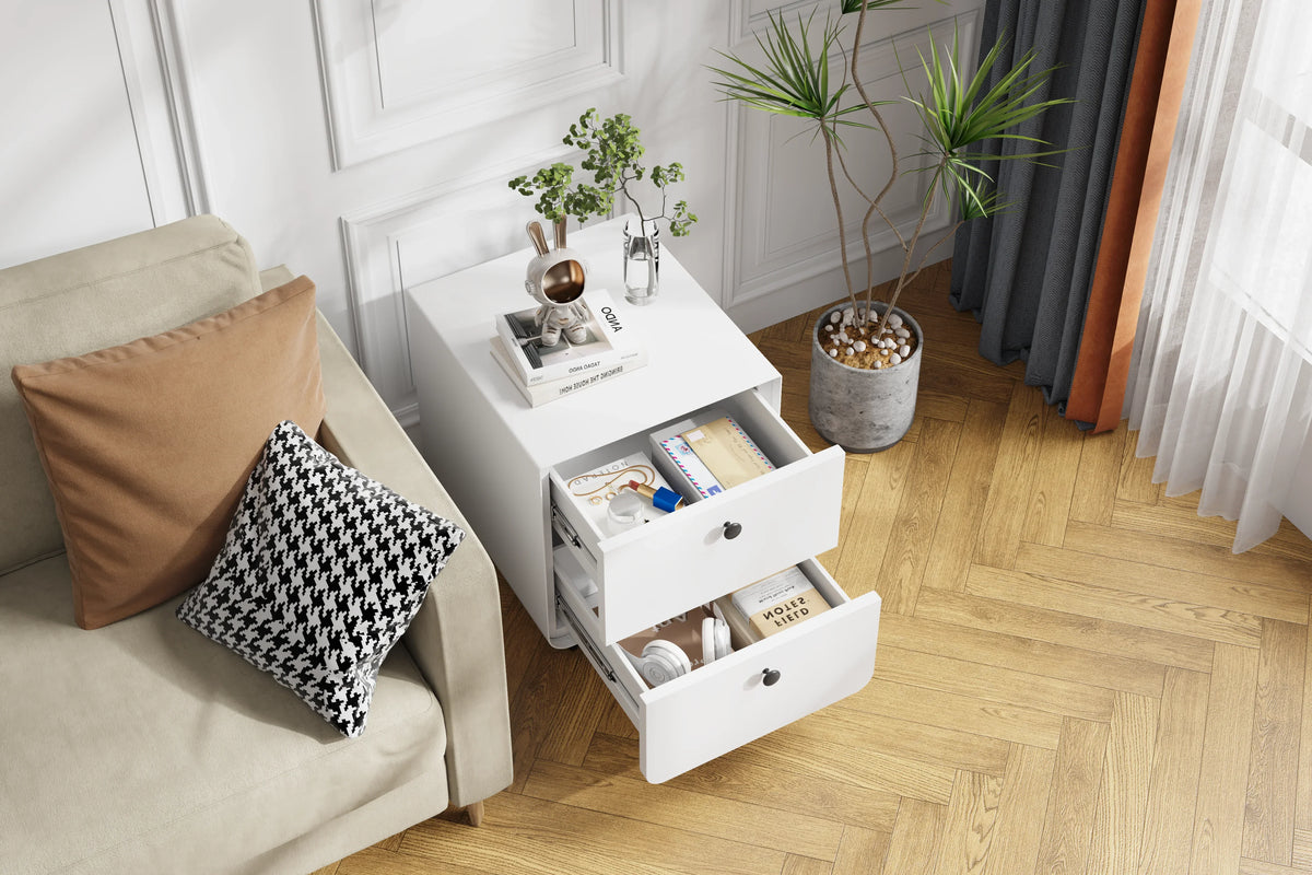 Modern white eprolo night stand storage cabinet with two open drawers in a bright living room.