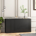 Modern black eprolo kitchen buffet with storage drawers and doors in a neutral living room