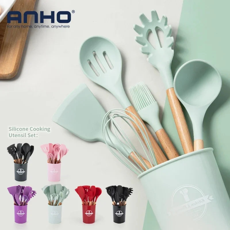 Mint green silicone cooking utensil set with wooden handles in a matching holder.