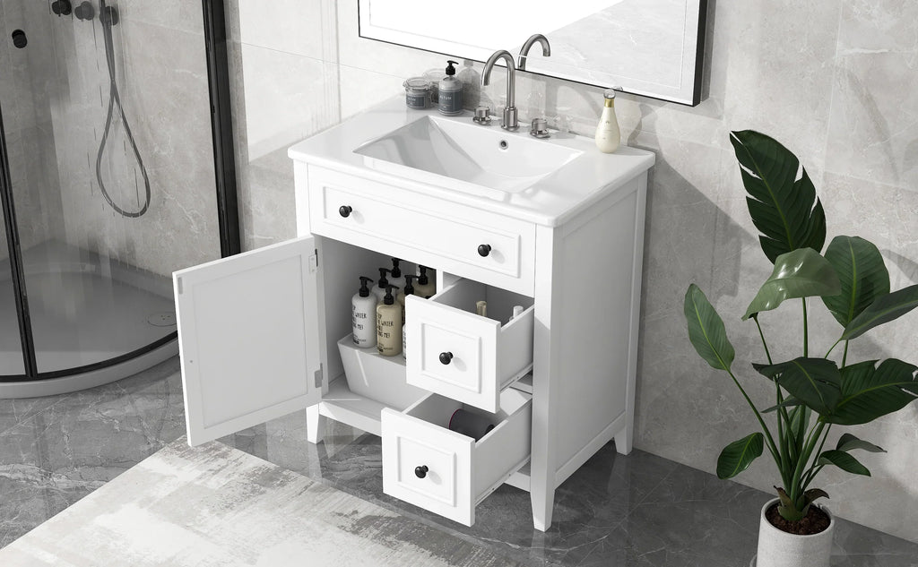 White 30 inch eprolo bathroom vanity cabinet with sink, one door, and two drawers.