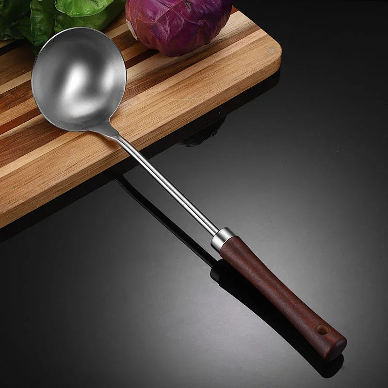 eprolo stainless steel ladle with a wooden handle on a wooden cutting board