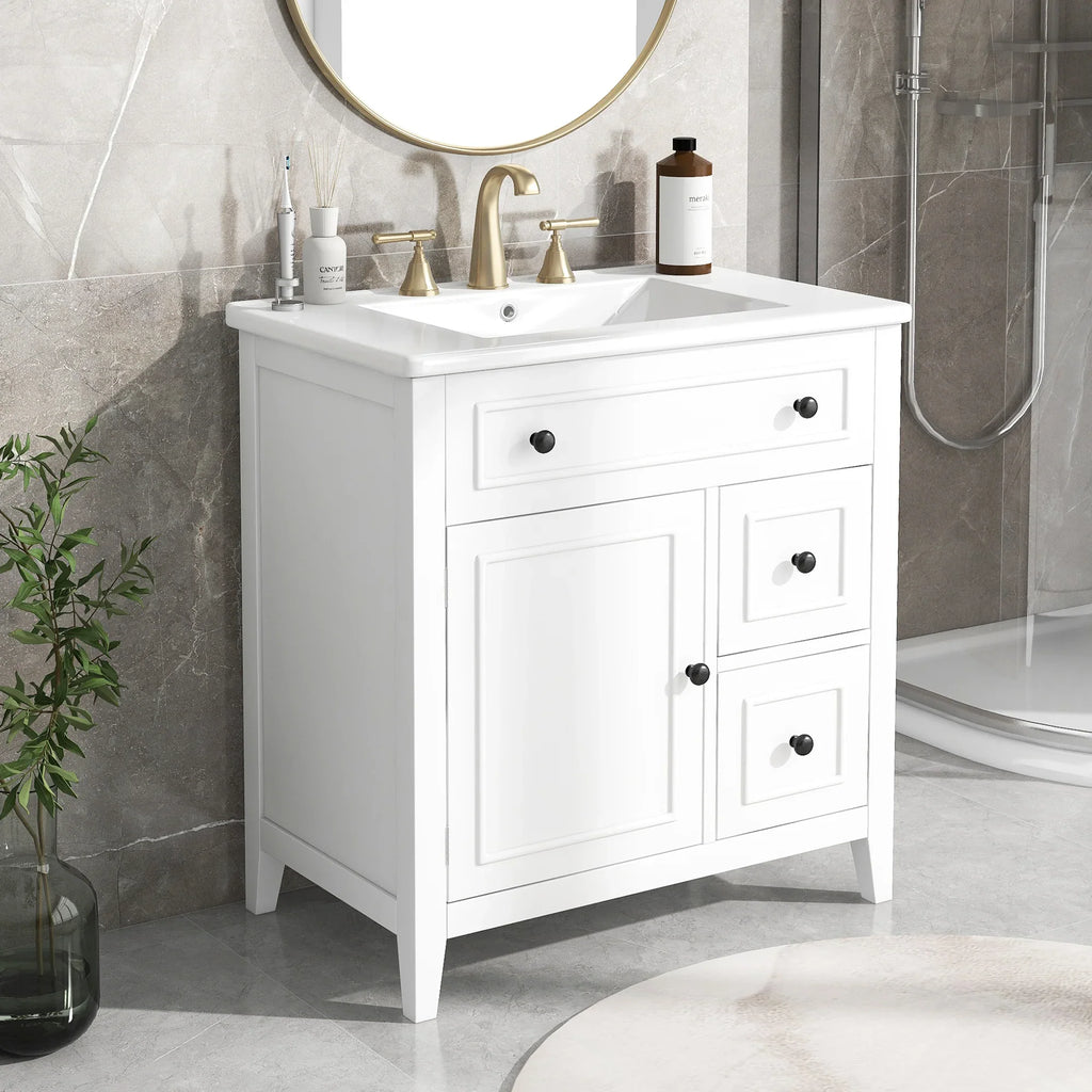 White 30 inch eprolo bathroom vanity cabinet with sink top, two drawers, and a door.