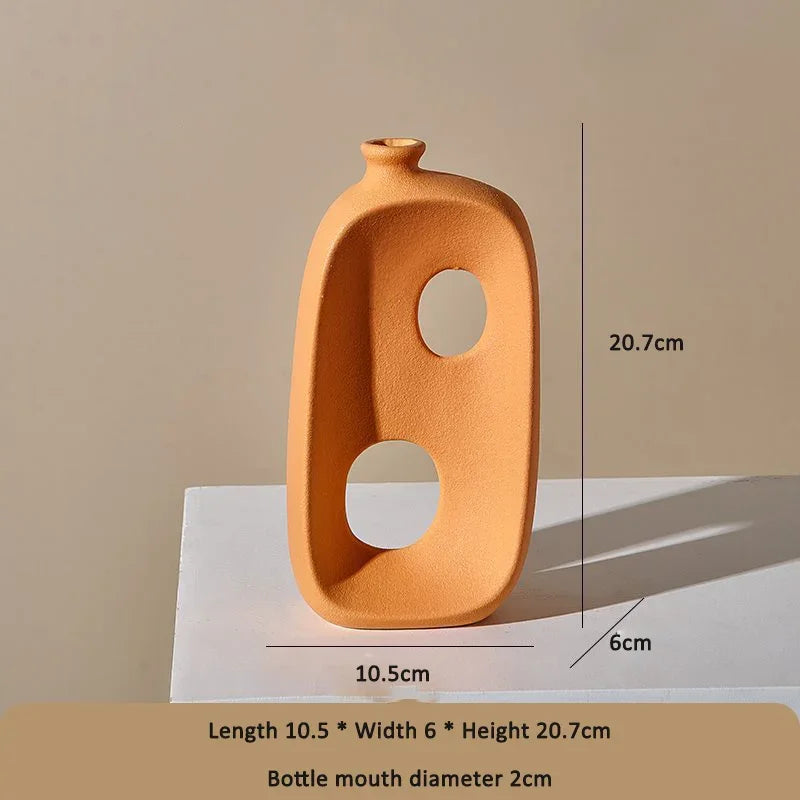 Orange eprolo ceramic vase with abstract hollow design and dimensions for home decor