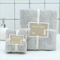 ePROLO bamboo charcoal coral velvet bath and face towel set in grey and white stripes.